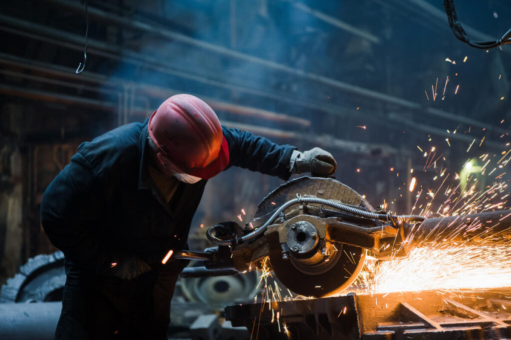 employee-grinding-steel-with-sparks-focus-on-gri-2023-11-27-04-59-54-utc